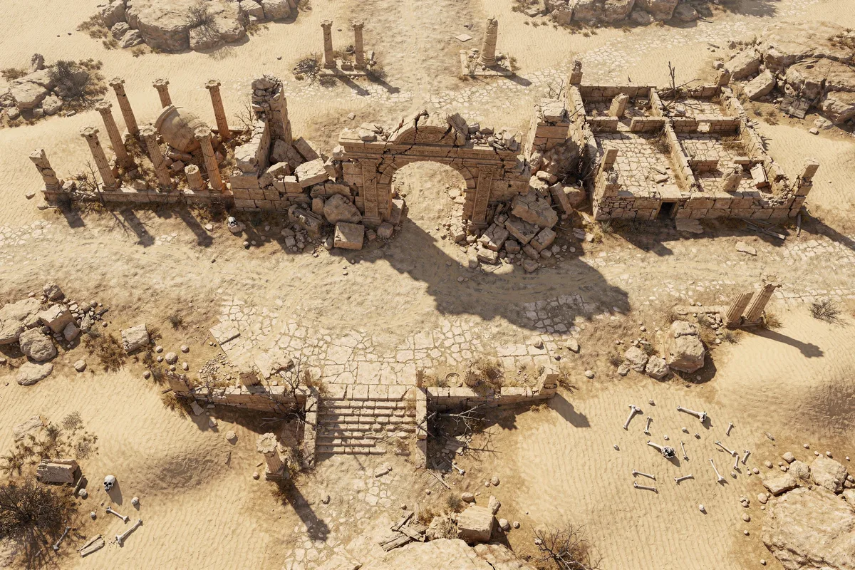 Top-down battlemap of desert ruins with the look of an aerial drone photograph: a broken arch and a colonnade casting long shadows on the sand, a roofless stone building, a paved road and a stair, scattered bones and skulls, dunes and dry scrub around it.